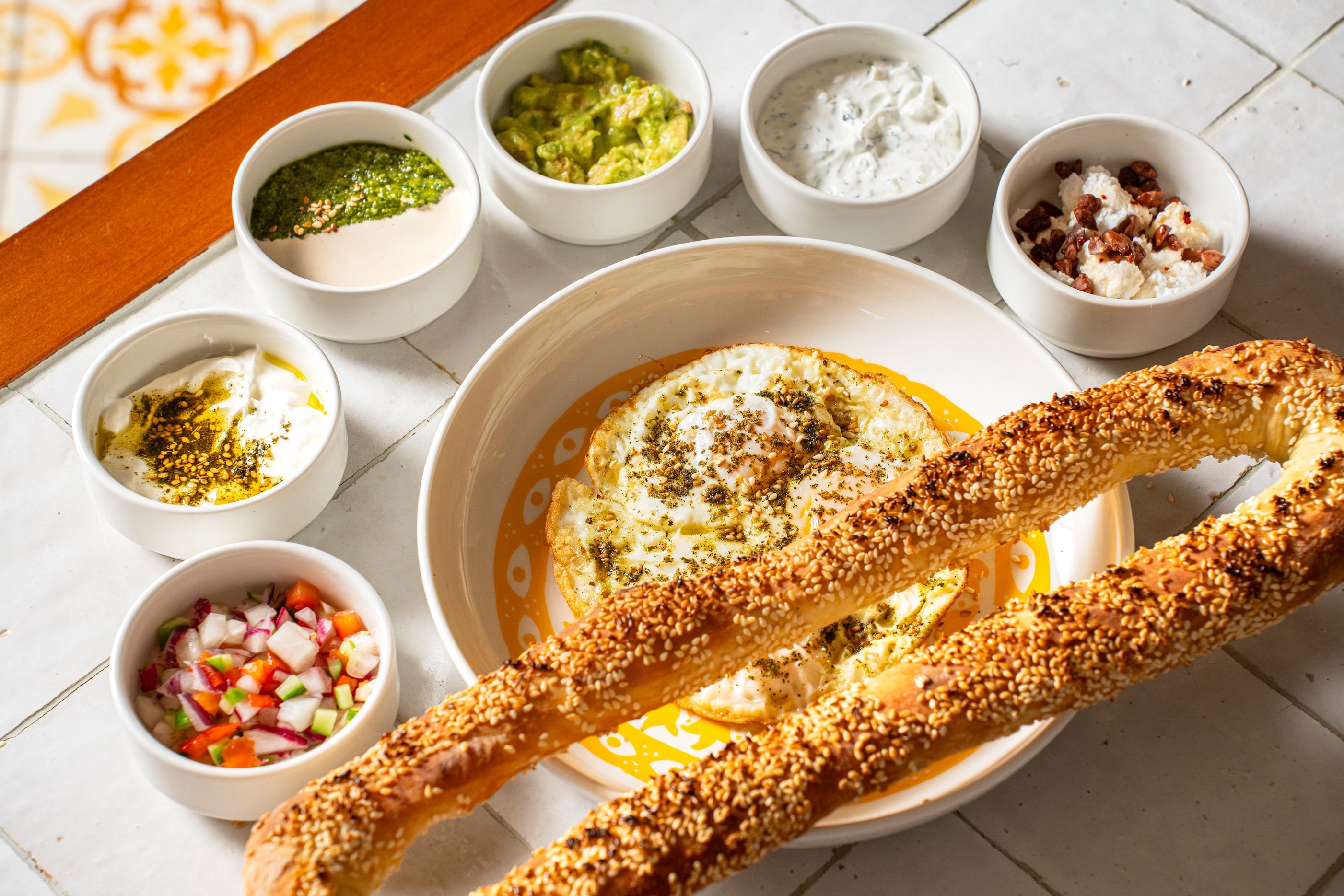 A spread including dips and bread from Mama Mezze in New York City