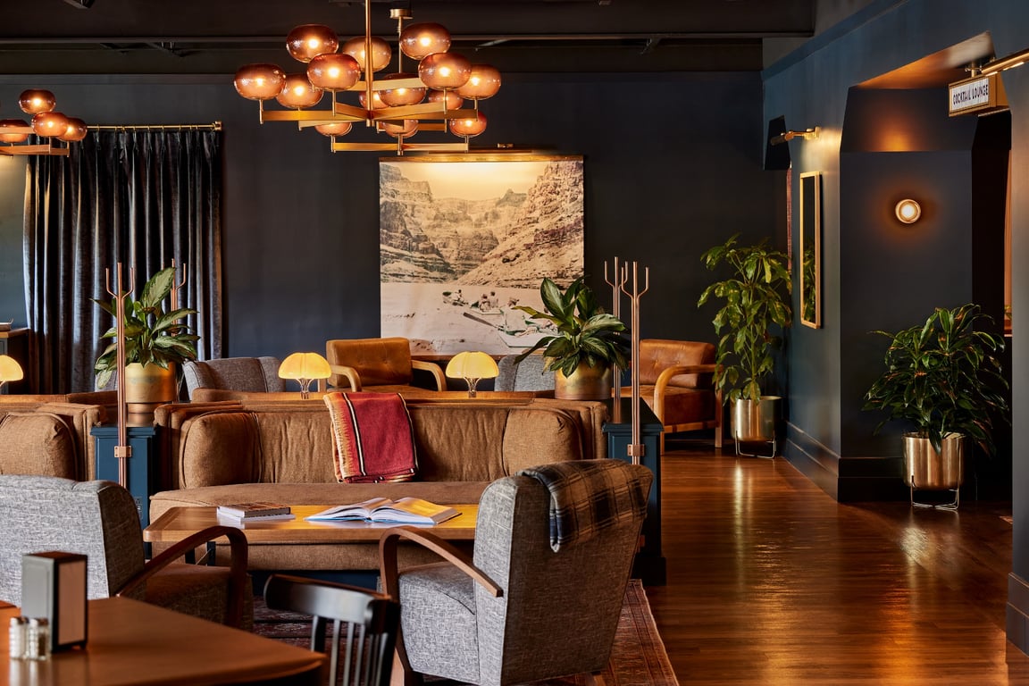 A Historic Route 66 Motel in Flagstaff Gets a Makeover | High Country Motor Lodge outdoor seating | High Country Motor Lodge lobby | High Country Motor Lodge the General Store | High Country Motor Lodge suite | High Country Motor Lodge suite