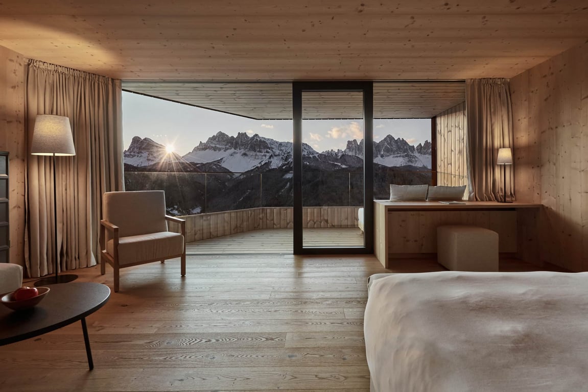 Hotel Review: Forestis Dolomites (Brixen) | Forestis Dolomites mountain view | Forestis Dolomites outdoor pool | Forestis Dolomites outdoor couches | Forestis Dolomites spa