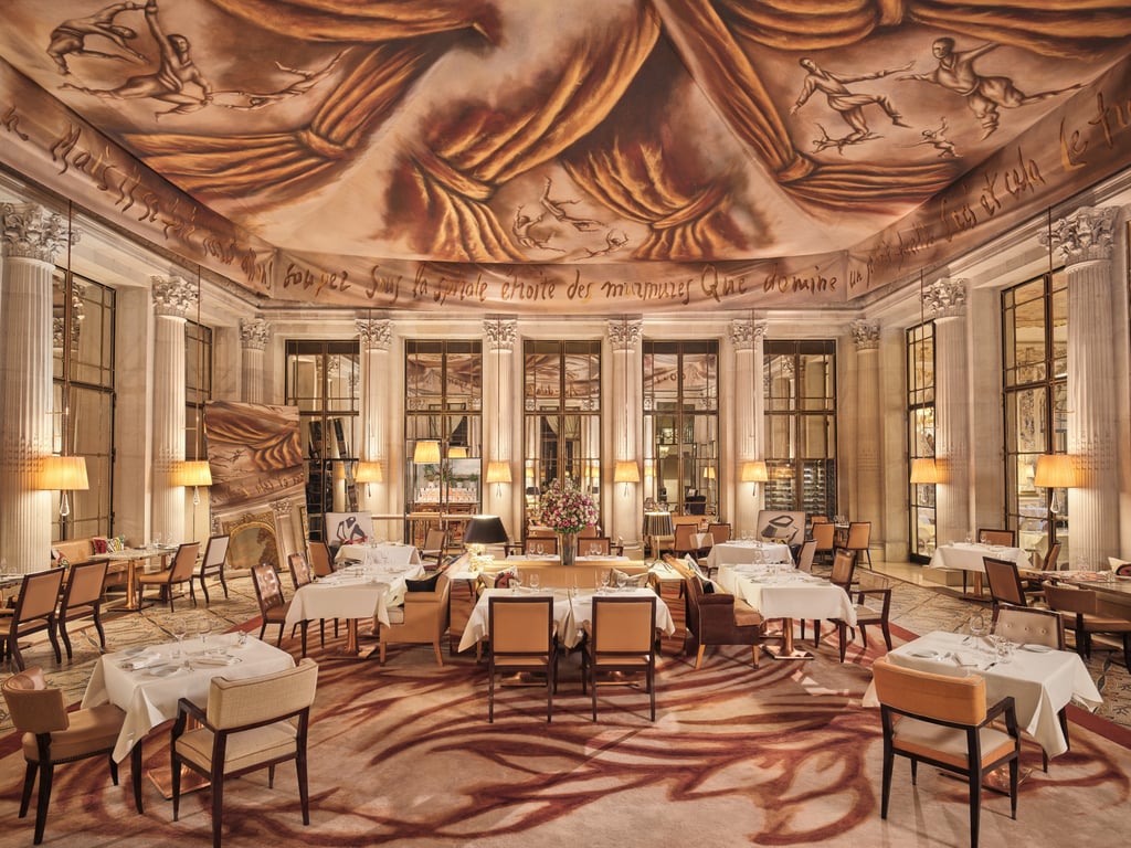 Restaurant Le Dalí Is the Mind-Bending Luxury Reservation for a Special Occasion Dinner in Paris | Restaurant Le Dalí columns | Restaurant Le Dalí decor | Restaurant Le Dalí lighting | Restaurant Le Dalí desert options | Restaurant Le Dalí signature dinner | Restaurant Le Dalí appetizer