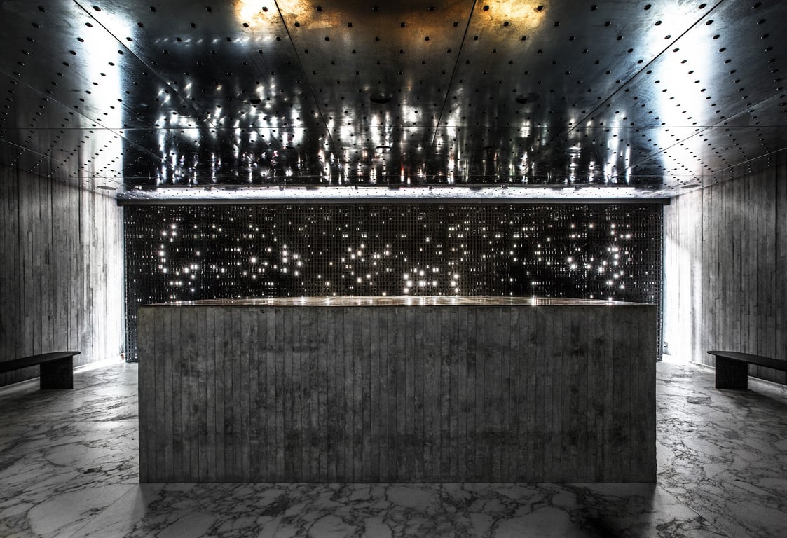 This Hong Kong Boutique Hotel Gives Off a Moody Minimalist Vibe | Tuve Hotel lobby | Tuve Hotel hallway | Tuve Hotel bedroom | Tuve Hotel bathroom