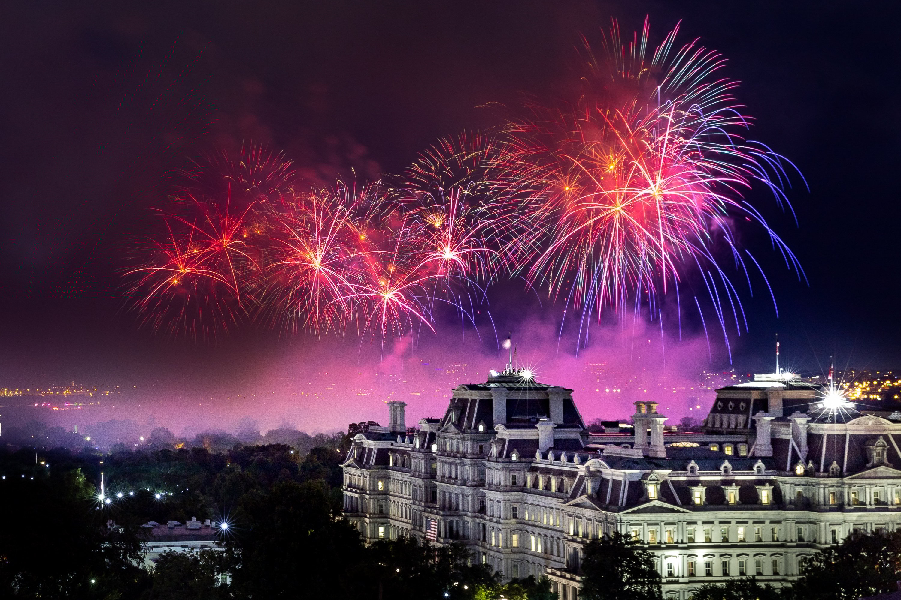 The White House and Eisenhower Executive Office Building are seen with Fourth of July Celebration fireworks on Sunday, July 4, 2021, from the roof of the Hay Adams Hotel in Washington, DC.