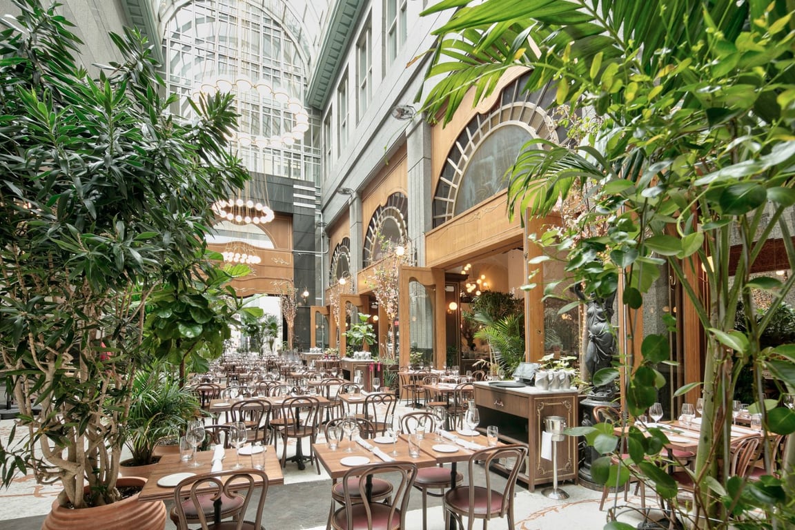 La Grande Boucherie bar seating | La Grande Boucherie interior | La Grande Boucherie appetizers | La Grande Boucherie steak dinner | La Grande Boucherie signature cocktail | This Elegant Parisian Steakhouse is the Best Place for French Cuisine in Midtown West