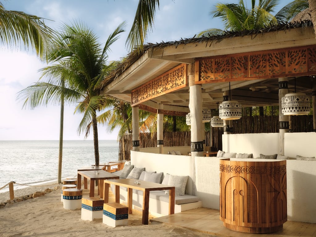 Kimpton Grand Roatán Resort & Spa exterior | Kimpton Grand Roatán Resort & Spa lobby | Kimpton Grand Roatán Resort & Spa bedroom suite | Kimpton Grand Roatán Resort & Spa outdoor pool | Kimpton Grand Roatán Resort & Spa outdoor pool seating | Kimpton Grand Roatán Resort & Spa pool