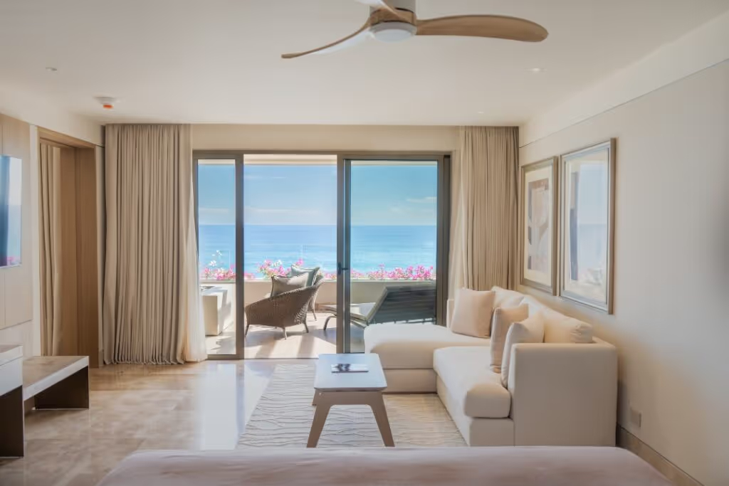In love? Here’s Why You Need to Go to Los Cabos’ Newest Hotel | Grand Velas Boutique Los Cabos suite living room | Grand Velas Boutique Los Cabos bedroom suite | Grand Velas Boutique Los Cabos outdoor pool | Grand Velas Boutique Los Cabos seating