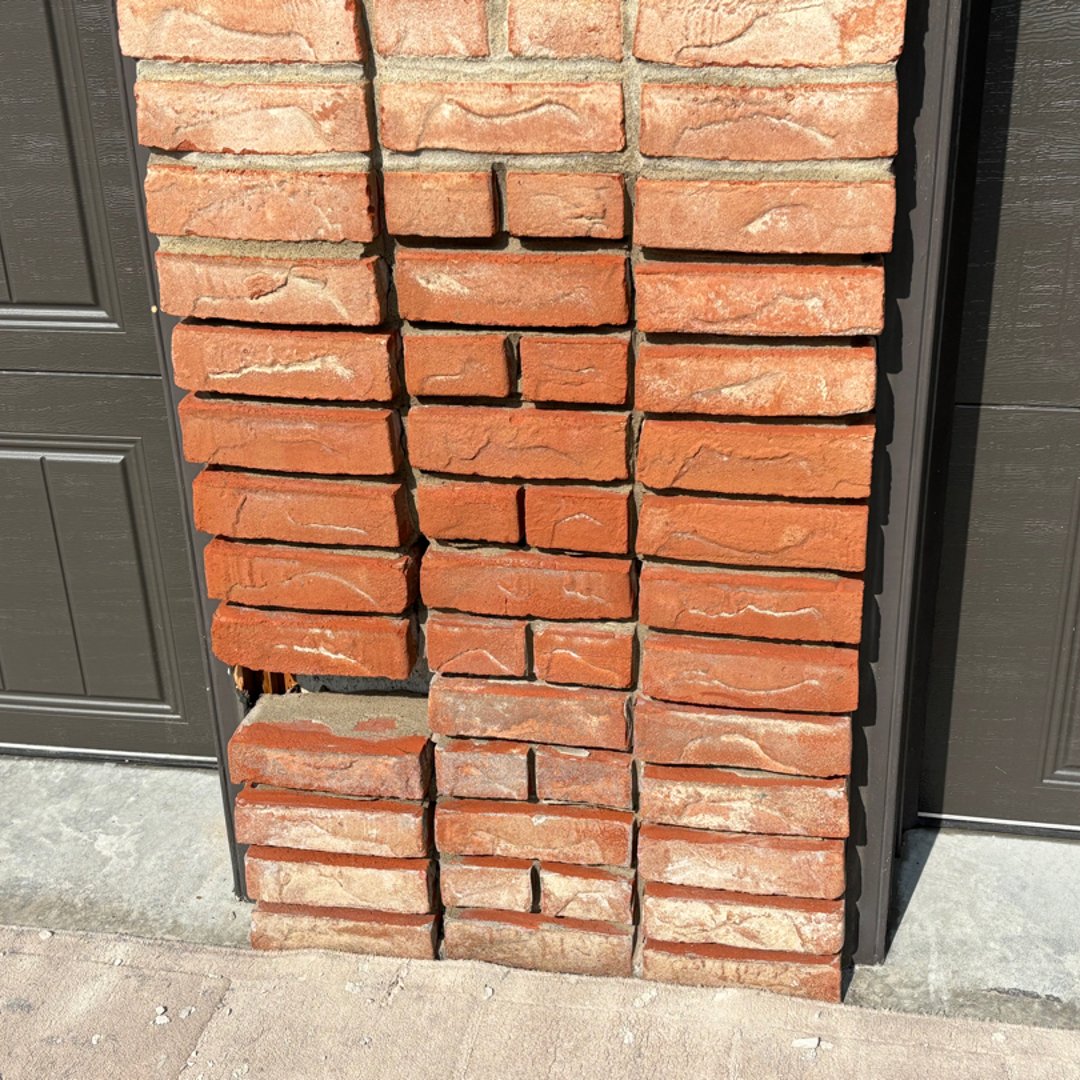 Before brick repair - damaged and deteriorated masonry