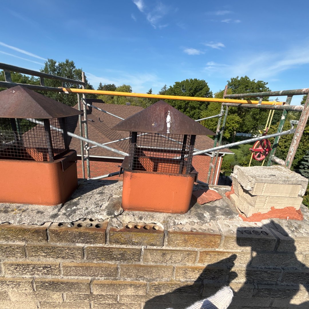 Complete chimney rebuild with proper crown and cap