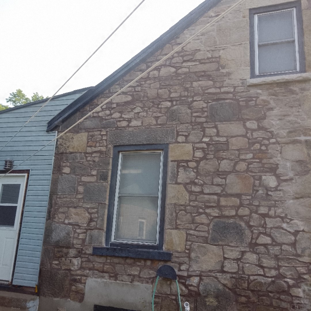 Heritage brick restoration work on a century home