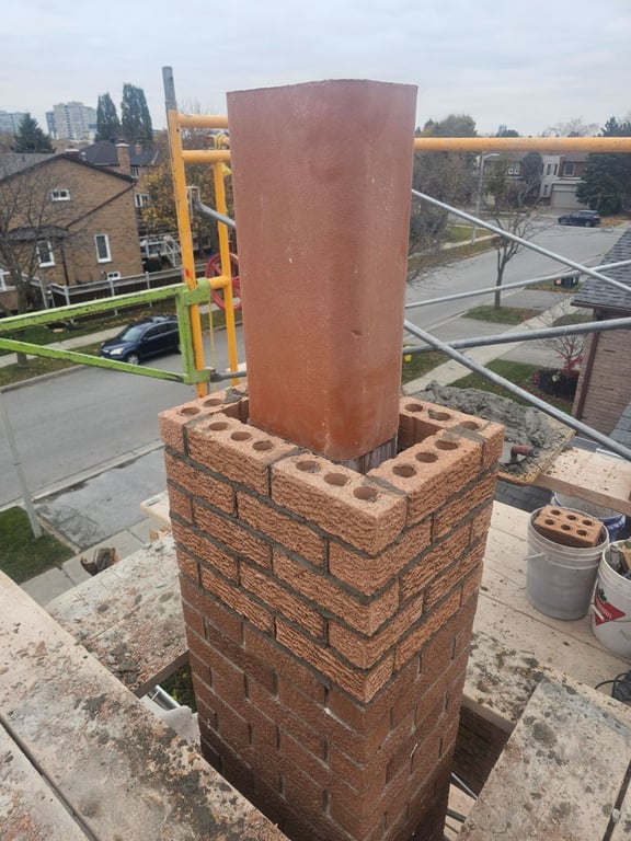 Chimney removal service showing safe demolition and roof restoration by professional masonry contractors