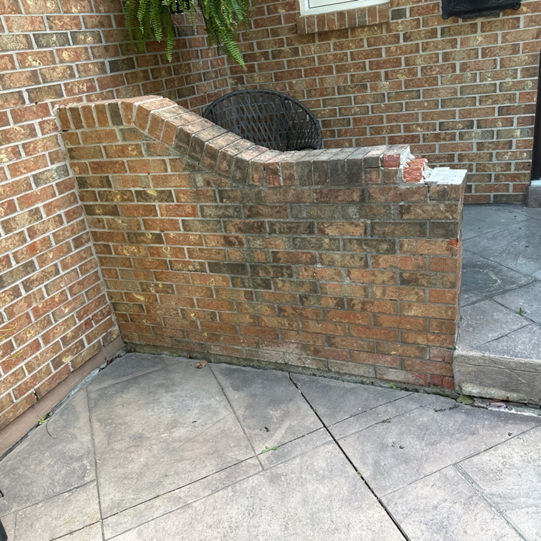 Before brick repair - damaged and deteriorated masonry