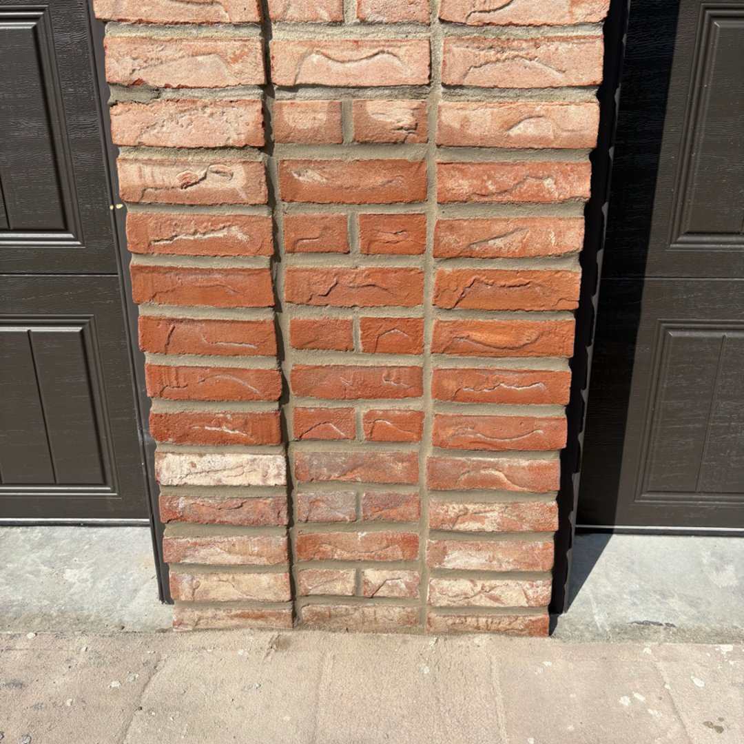 After brick repair - restored masonry with seamless integration