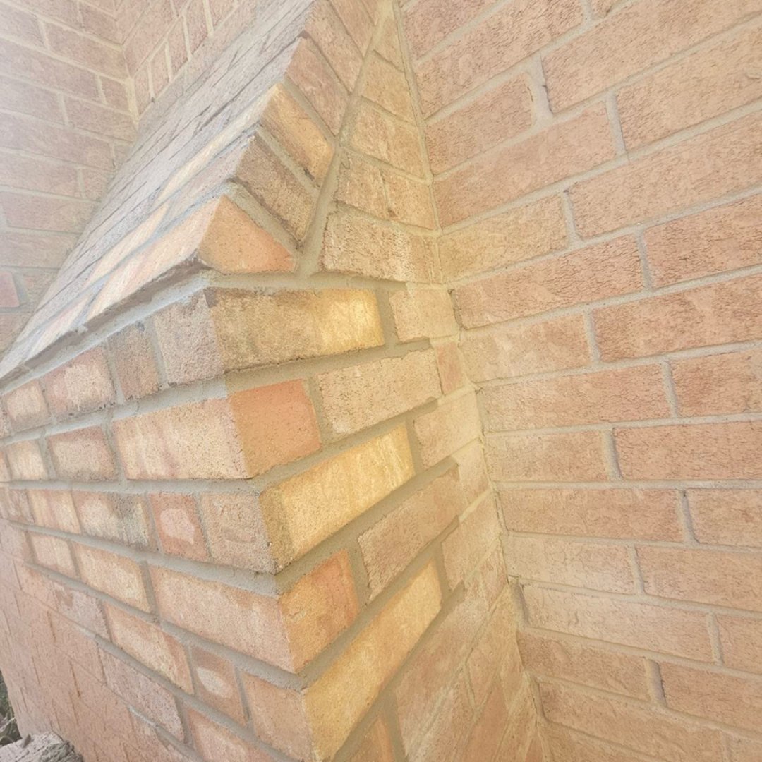 After brick repair - expertly restored and matched masonry