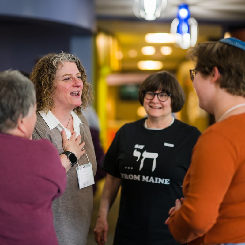 a group of people chatting