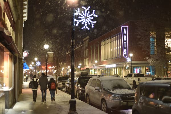 A snowy evening in front of the Paul J. Schupf Art Center.