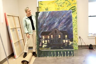 Tessa Greene O’Brien with a recent painting. Photography by Amanda Mao, Class of 2026.