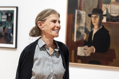 Dorothy Lichtenstein with a self-portrait painted by her late husband Roy Lichtenstein