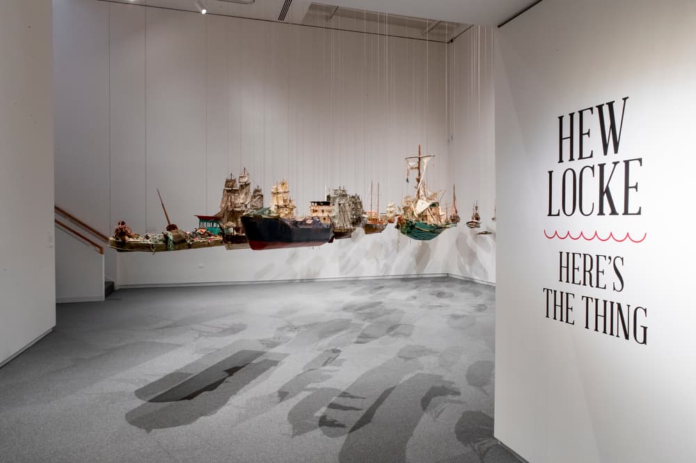 Title wall and selection of artwork from Hew Locke: Here's the Thing, an exhibition at Colby College Museum of Art in 2020