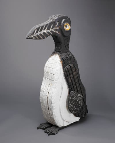 An auk carved out of wood and painted.