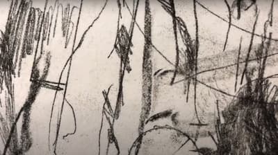 Abstract black and white sketch with varied lines and shading.