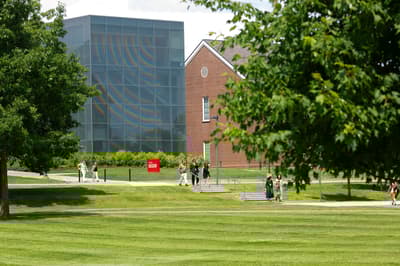 People walking in front of Colby Museum.