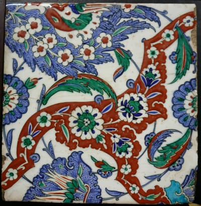 An intricate floral design in red, green, and blue.