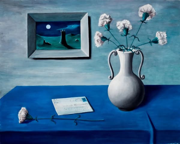 An oil on canvas painting by Gertrude Abercrombie of a white vase with flowers on top of a table covered in a blue tablecloth. Next to the vase on the left, there is a letter and a flower. Behind the table, there is a framed painting with a moon.