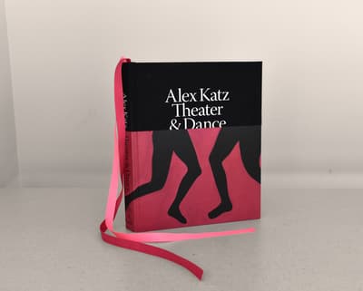 Alex Katz: Theater and Dance publication standing up on a table top showing front cover