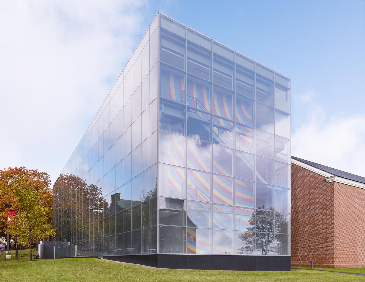 Exterior of Colby Museum with Sol LeWitt wall drawing visible through glass.