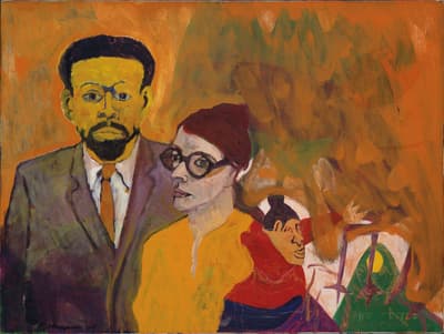 Portrait of a man, woman and child. The man is wearing a suit and has a beard, the woman is wearing a yellow shirt and large glasses, and the child is wearing a red blanket or scarf.