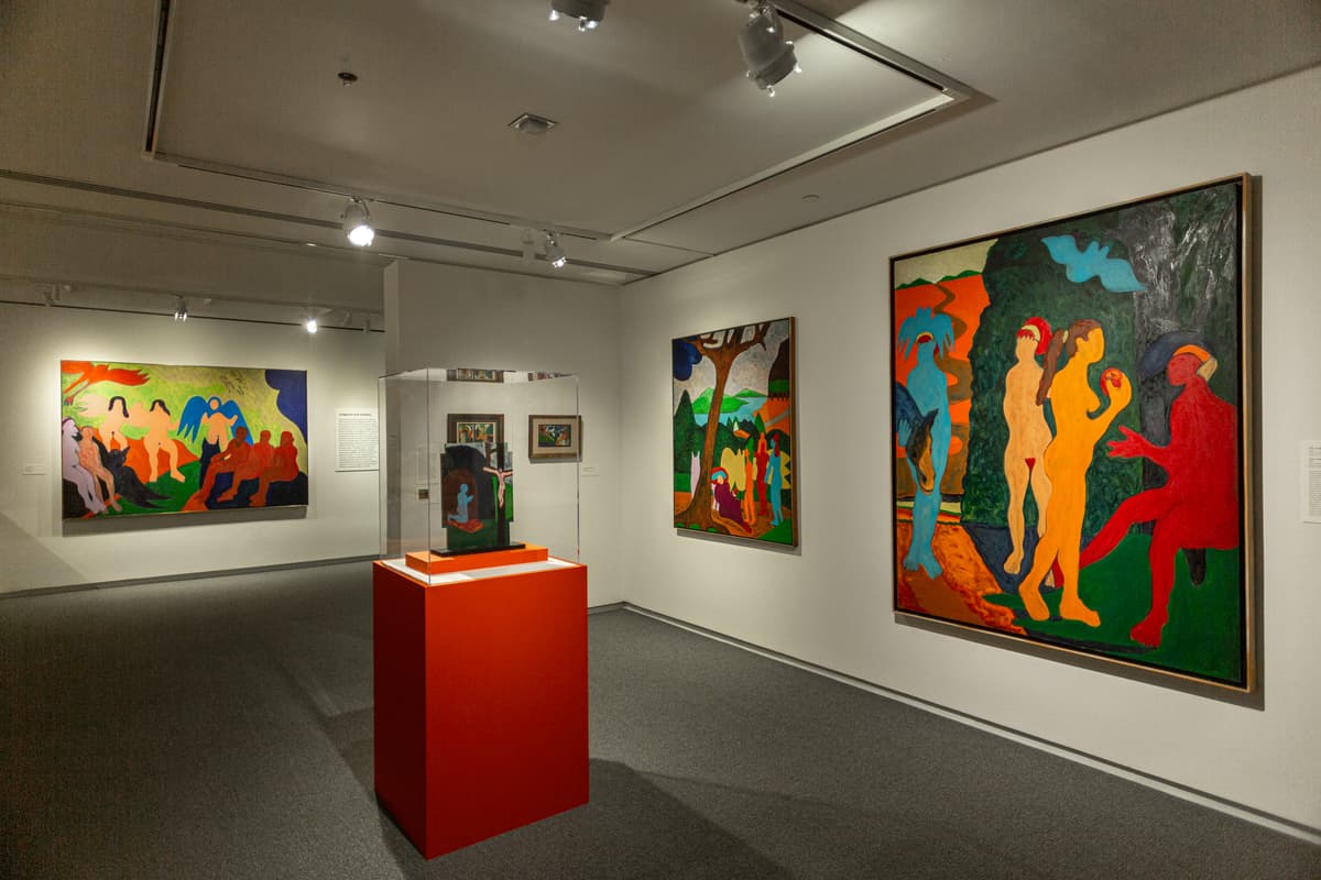 Instillation view of Bob Thompson: This House is Mine including two larger paintings and a plexiglass case with a red bottom.