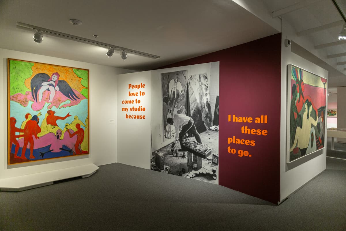Painting in Bob Thompson: This House is Mine and orange wall text.