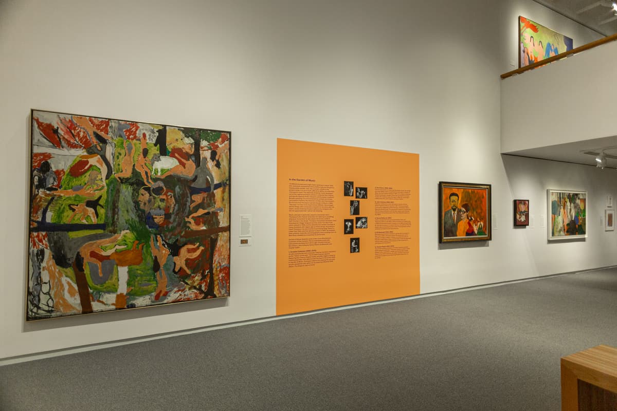 Instillation view of Bob Thompson: This House is Mine with multiple paintings and a large orange square overlaid with wall text.