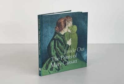 Inside Out: The Prints of Mary Cassatt publication standing on tabletop displaying front cover