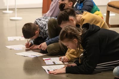 Group of children doing a worksheet activity