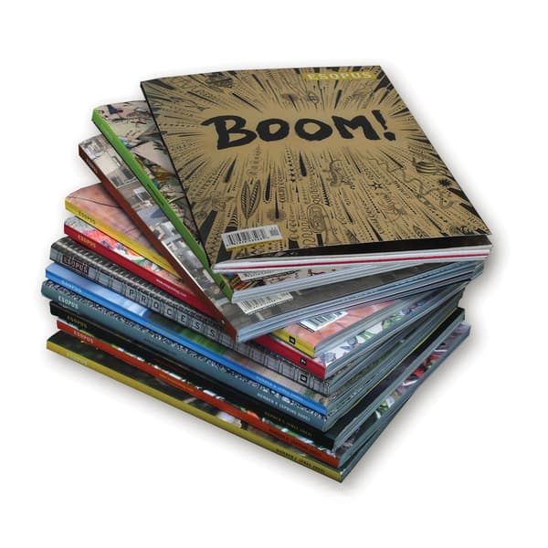 A stack of eleven issues of ESOPUS magazine fanned out against a white background.