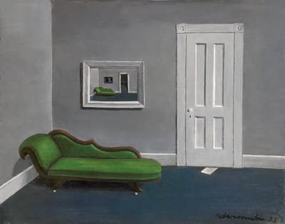 A green chaise longue against a gray wall with a mirror above and a white door beside it.