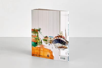 Hew Locke: Here’s the Thing publication standing up on tabletop displaying back cover