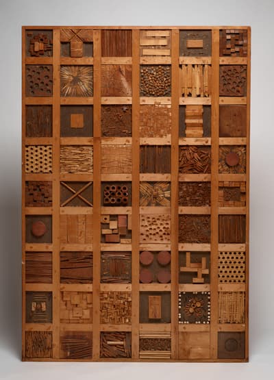 A wooden panel divided into a grid of 54 squares, each with unique wooden patterns and textures.