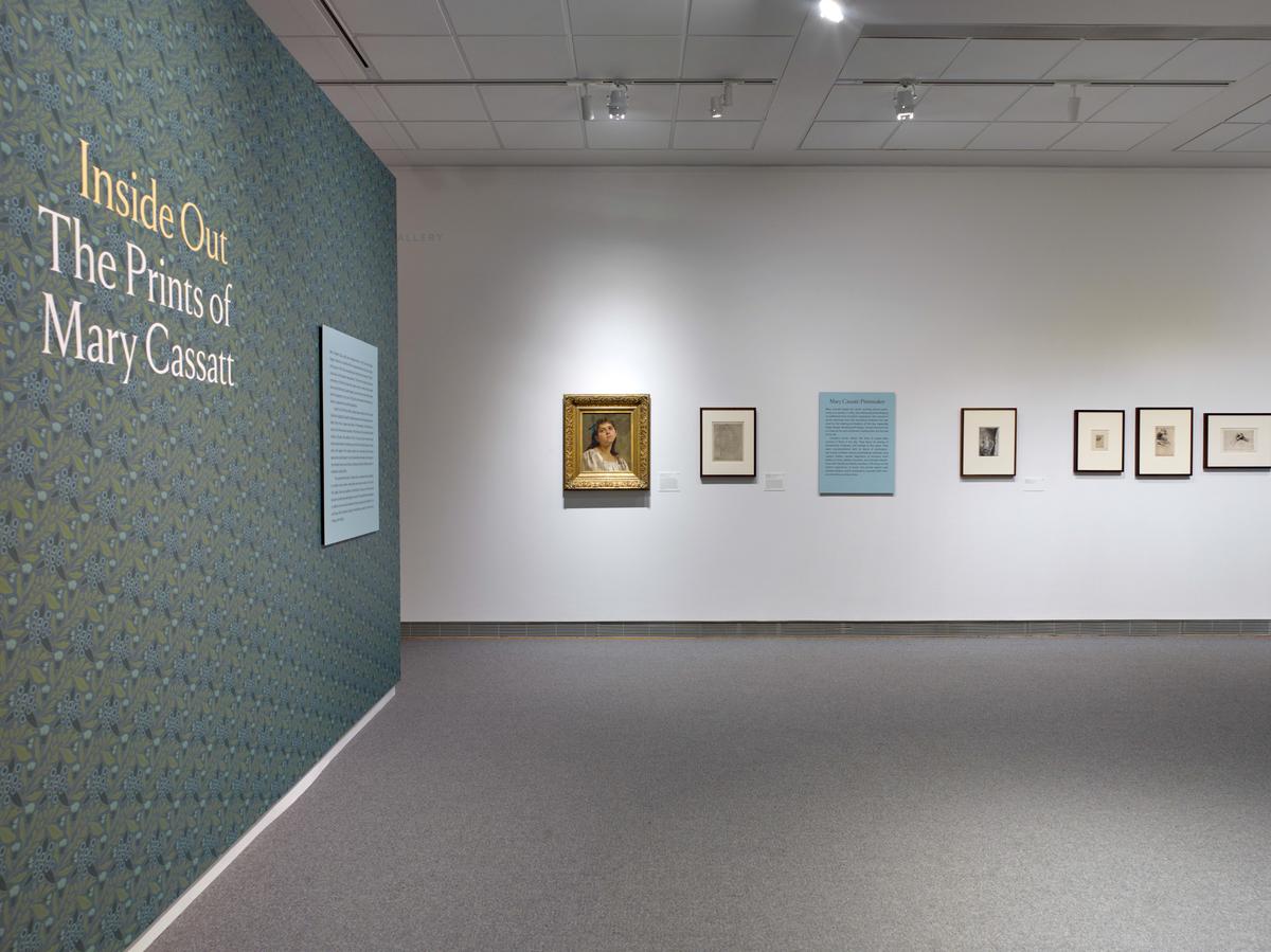 Art gallery exhibit titled "Inside Out: The Prints of Mary Cassatt" with framed artworks displayed on a white wall.