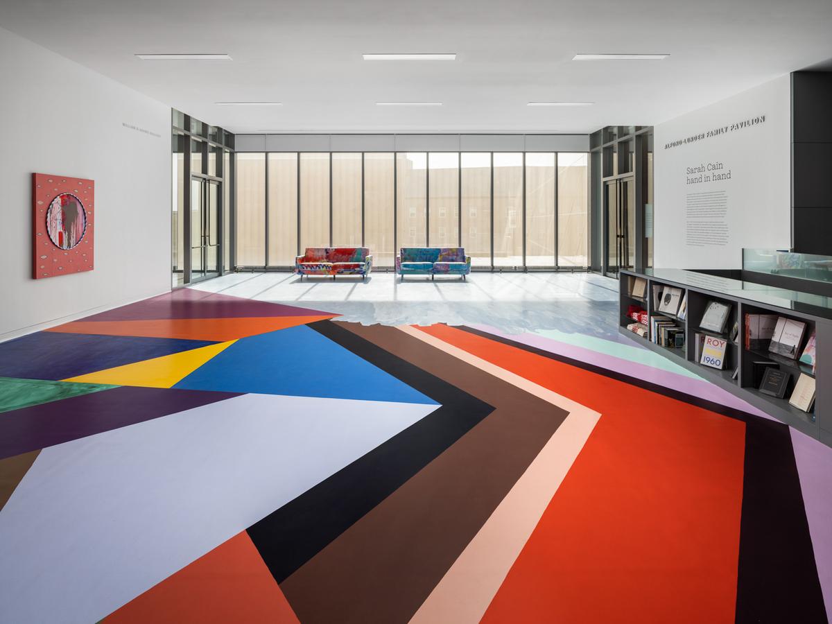 Installation view of Sarah Cain: hand in hand, William D. Adams Lobby, Colby College Museum of Art, Waterville, Maine, 2022. Photo: Trent Bell