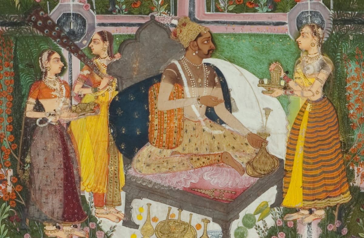 Three women standing around a seated man holding a fan, saucers, and a tea kettle.