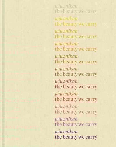 Book cover for Wiwenikan: the beauty we carry; a beige textured background with a gradient color scheme, reading “wíwənikan the beauty we carry.”
