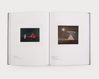 Open book displaying two pages, both with captions and an image of a painting