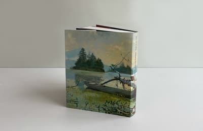 Back cover of the book "Art at Colby" featuring a painting of an outdoor scene in which a man stands atop a canoe holding an oar and gazing into the landscape beyond.