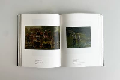 Interior spread of a book. On the right hand page there is an image of a painting and caption information. On the left hand side there is a painting with caption information.
