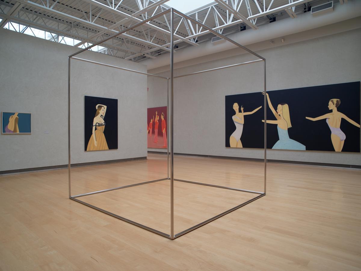 Square metal frame sculpture and four paintings with stylized dancers.