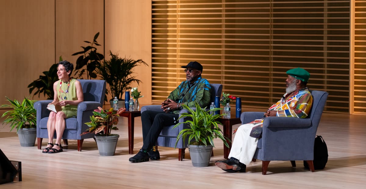 Jacqueline Terrassa, Nari Ward, Douglas R. Ewart seated on a stage.