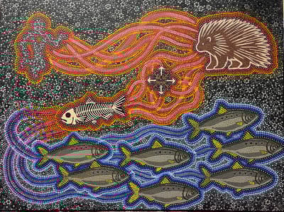 A contemporary Indigenous dot painting by James Eric Francis titled mάwαməwak (They are Together), rendered in black, gray, red, orange, yellow, blue, and purple dots on a black background. The painting features two main horizontal zones: an upper section with a human-like silhouette and a porcupine, connected by swirling orange and red streams. The lower section features six detailed fish (possibly herring or smelt) swimming in a purple and blue stream, which originates from the porcupine. A central black and white fish skeleton bridges the two zones, with a four-directional arrow symbol above it.