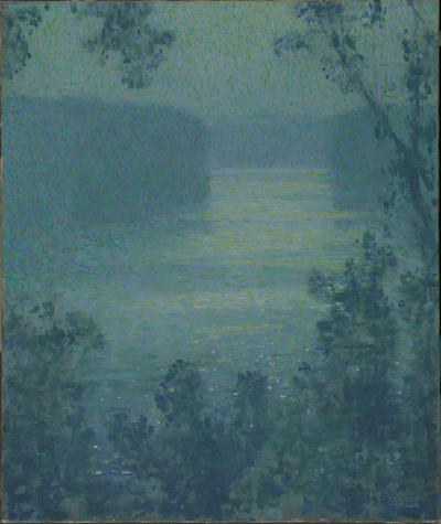A Tonalist landscape painting featuring a wide river or lake at twilight, rendered in deep blues and greens. The scene is viewed through a frame of dark, silhouetted trees in the foreground. Small, distant lights are visible on the far shore, reflecting faintly on the water's surface.