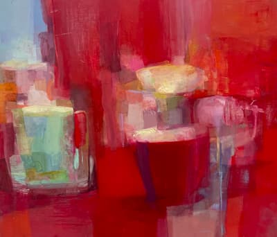 Expressive oil painting with a vibrant red and red-violet background and table surface. The central composition features two abstracted vessel forms—a small light-green pitcher and a larger red bowl with a pink foot—rendered with visible, blocky brushwork and layered pigments.
